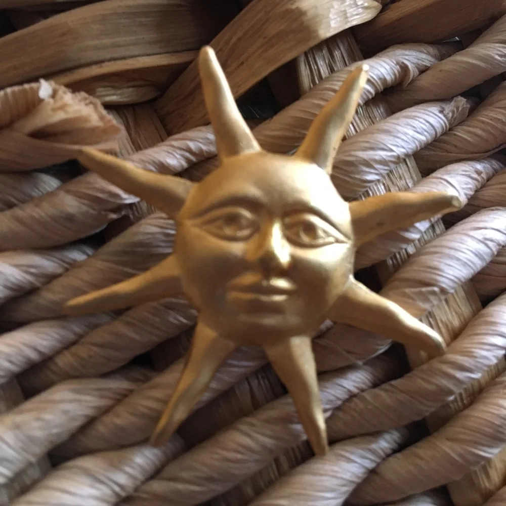 Vintage gold painted sun tac pin brooch